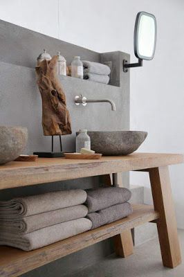 Bathroom wall-mounted faucet with vessel sink.