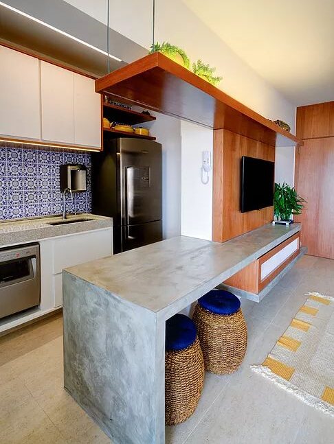 Custom kitchen design - concrete countertop with waterfall side