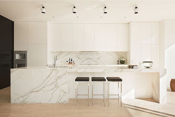 square laminated mitered edge profile on kitchen island countertop - bancksplash in the same material - white marble