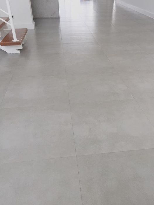 tiles that look like concrete on living room floor