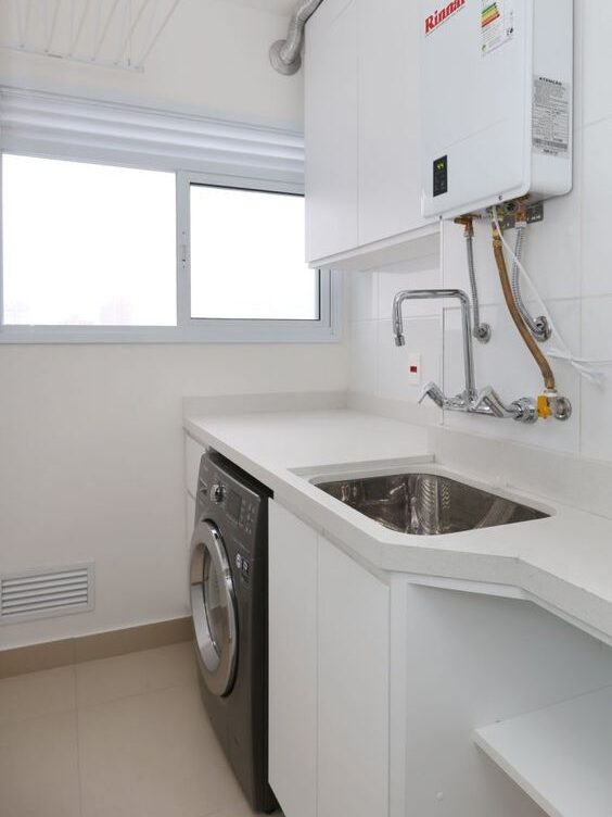 Laundry wall-mounted bridge faucet.