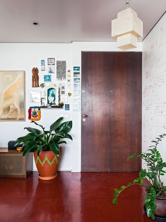 Pigment colored concrete living room floors - red