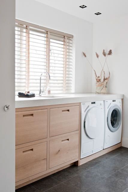 Ideal dimensions of a laundry countertop with embedded sink over the washer and dryer