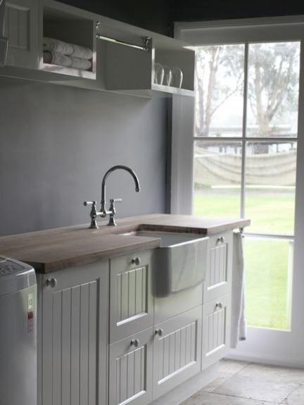 Laundry deck-mounted bridge faucet.