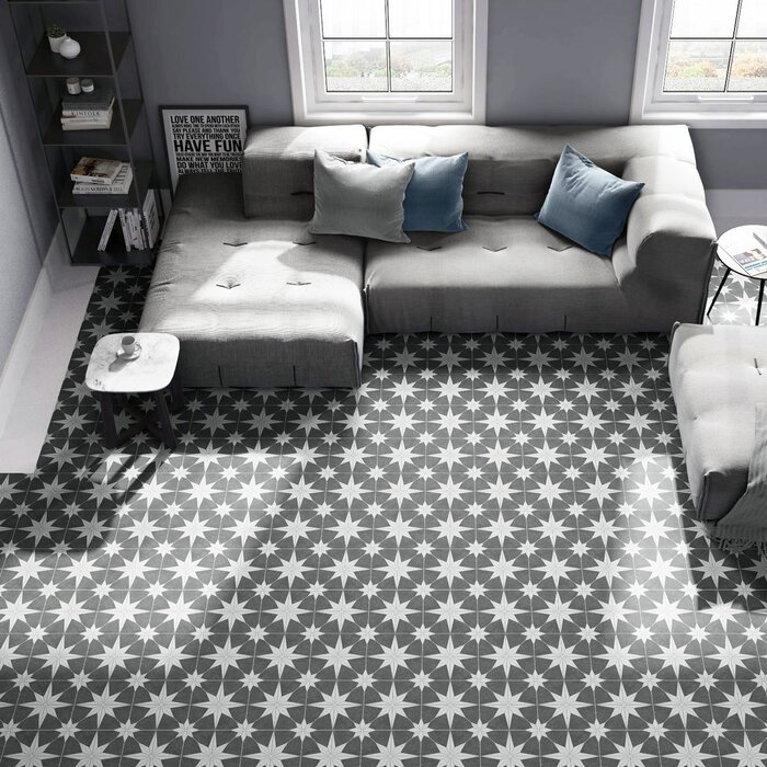 black and white patterned tiles on living room floor