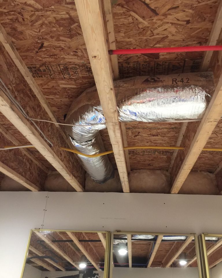 Flexible duct for range hood, to be hidden by false ceiling.